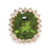 A 14 Karat Yellow Gold, Peridot and Diamond Ring, 11.95 dwts.