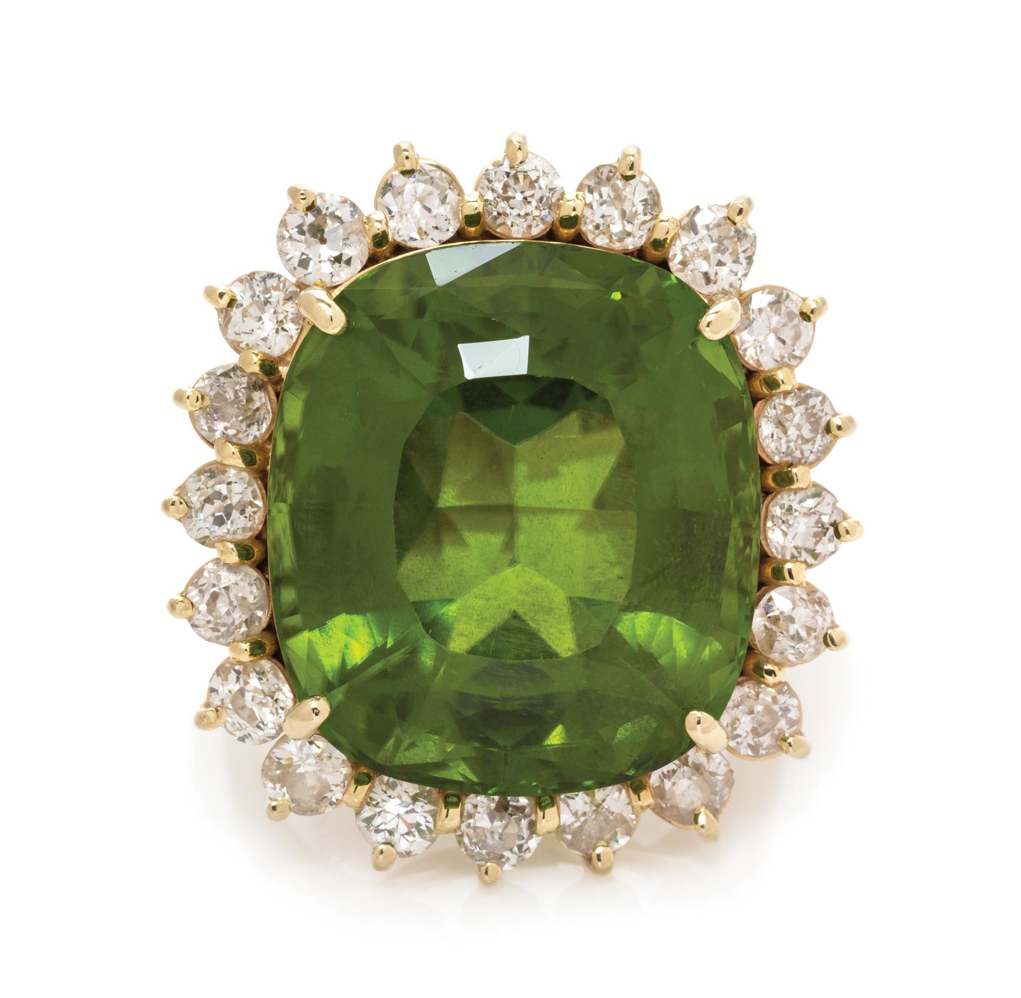 A 14 Karat Yellow Gold, Peridot and Diamond Ring, 11.95 dwts.