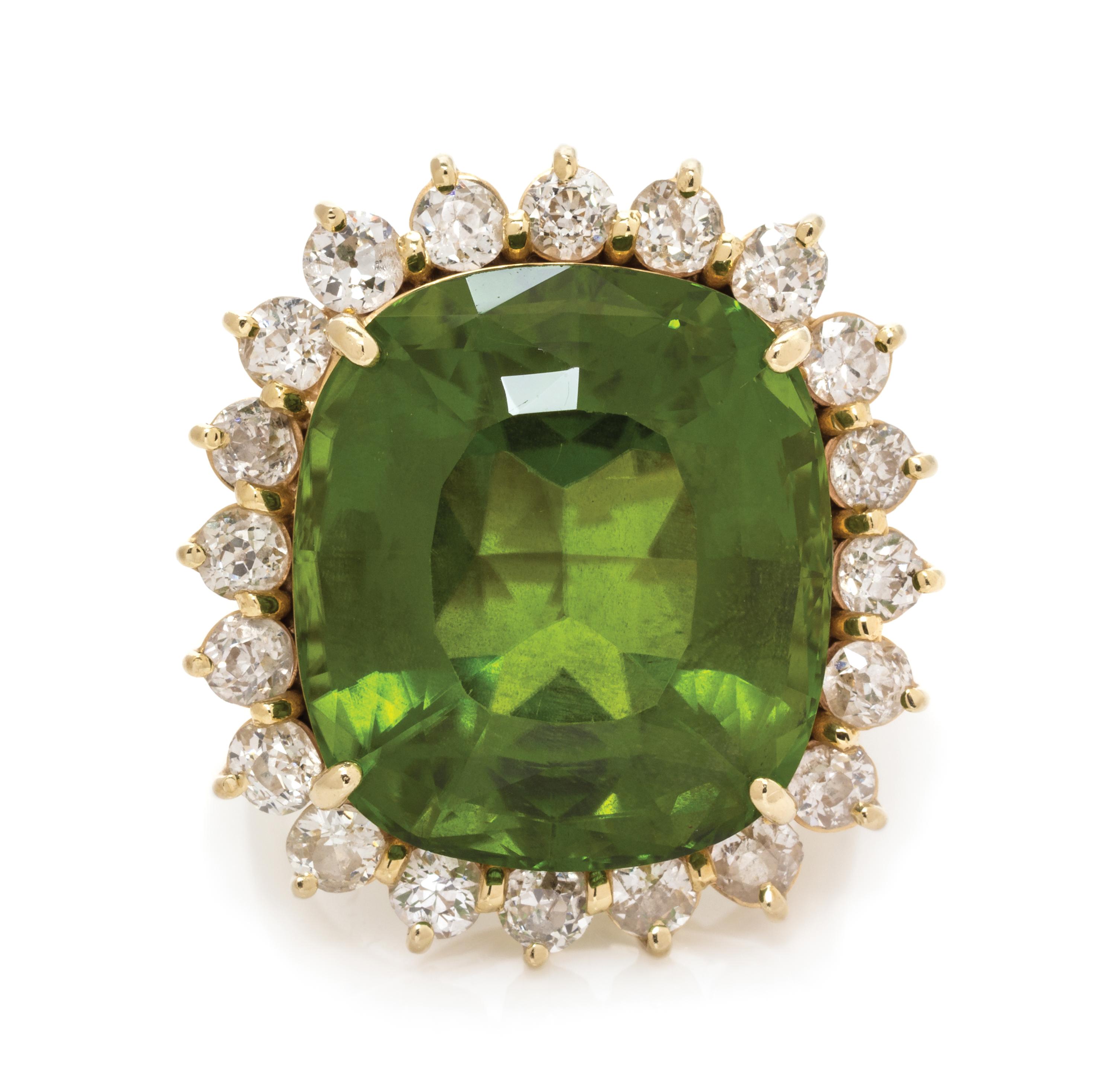 A 14 Karat Yellow Gold, Peridot and Diamond Ring, 11.95 dwts.