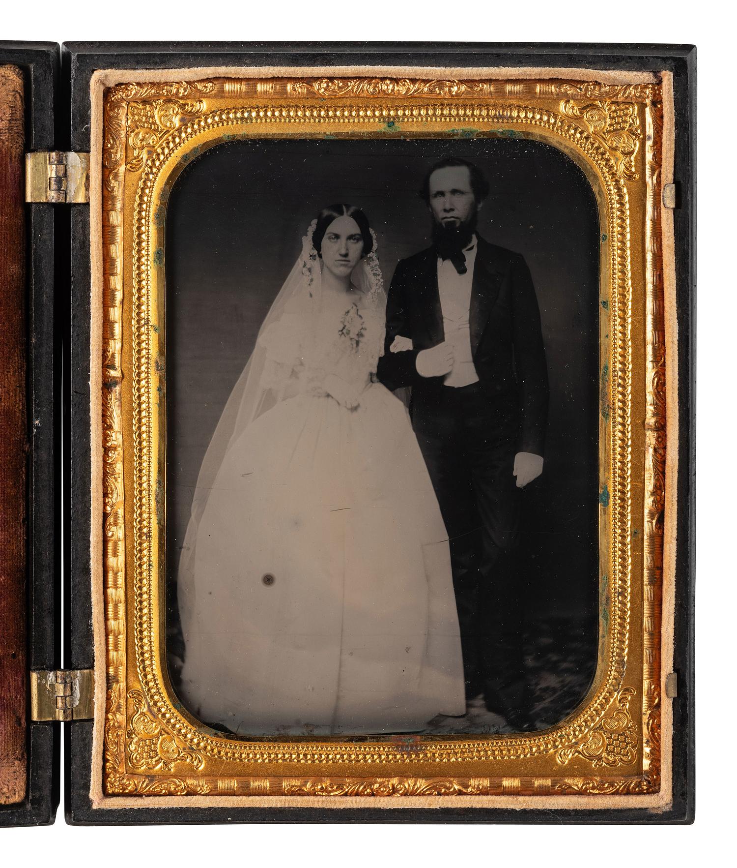 [EARLY PHOTOGRAPHY]. 3 half plate figural Union cases, one containing tintype of a wedding couple.