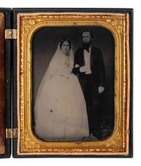 [EARLY PHOTOGRAPHY]. 3 half plate figural Union cases, one containing tintype of a wedding couple.