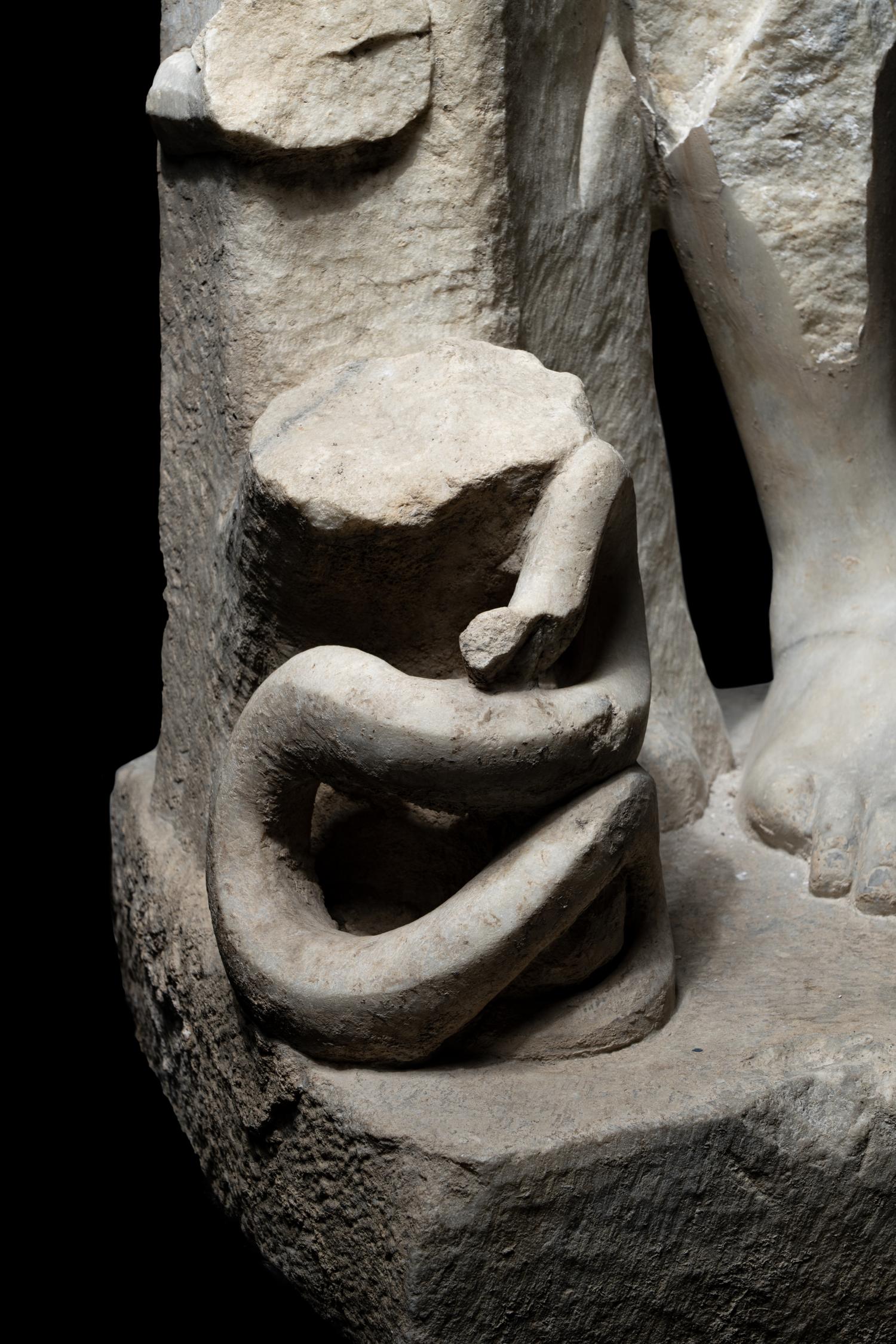 A Roman Marble Base Fragment, Possibly of Apollo or Asklepios