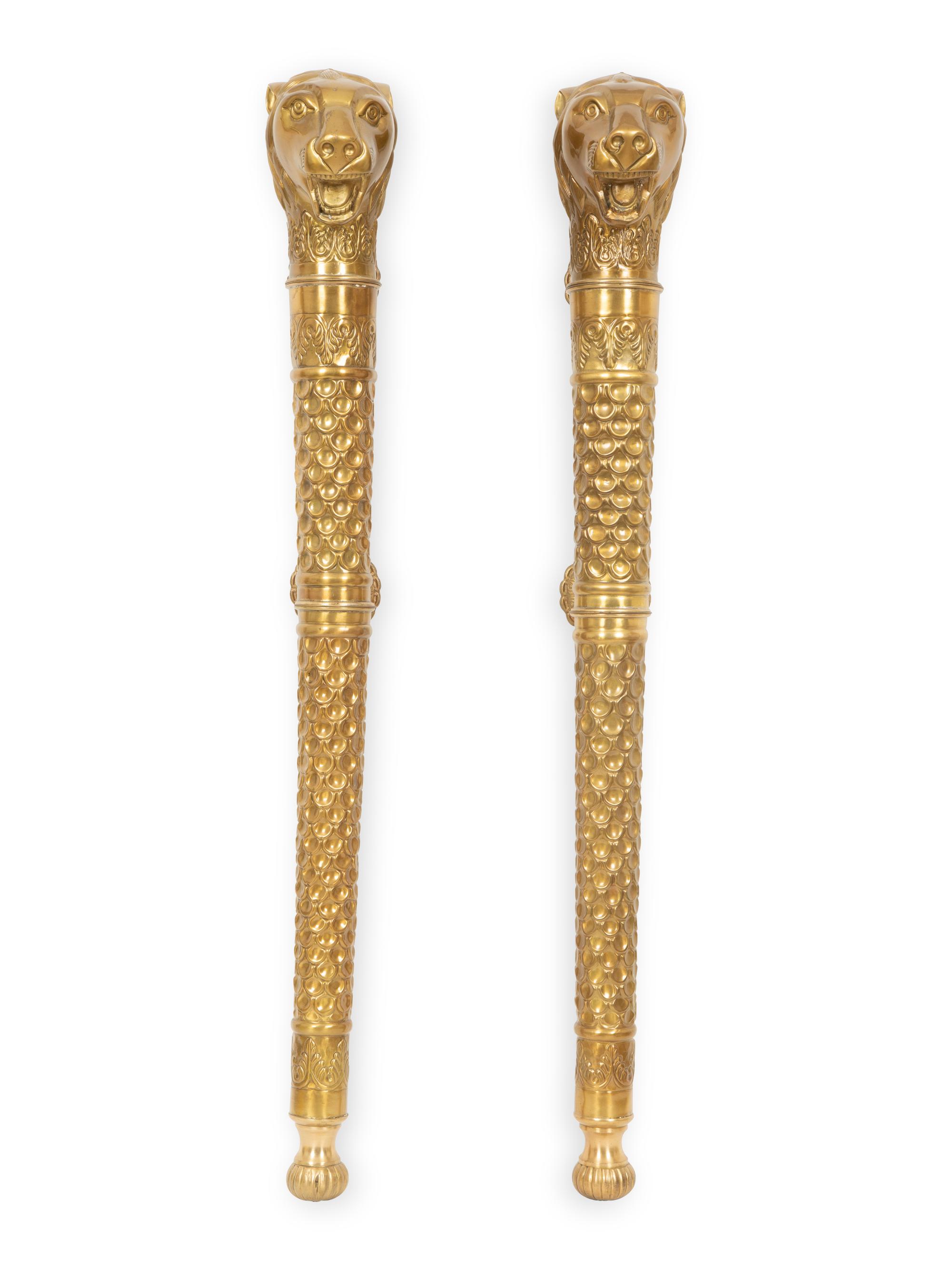 A Pair of Continental Chased Brass Door or Wall Mounts