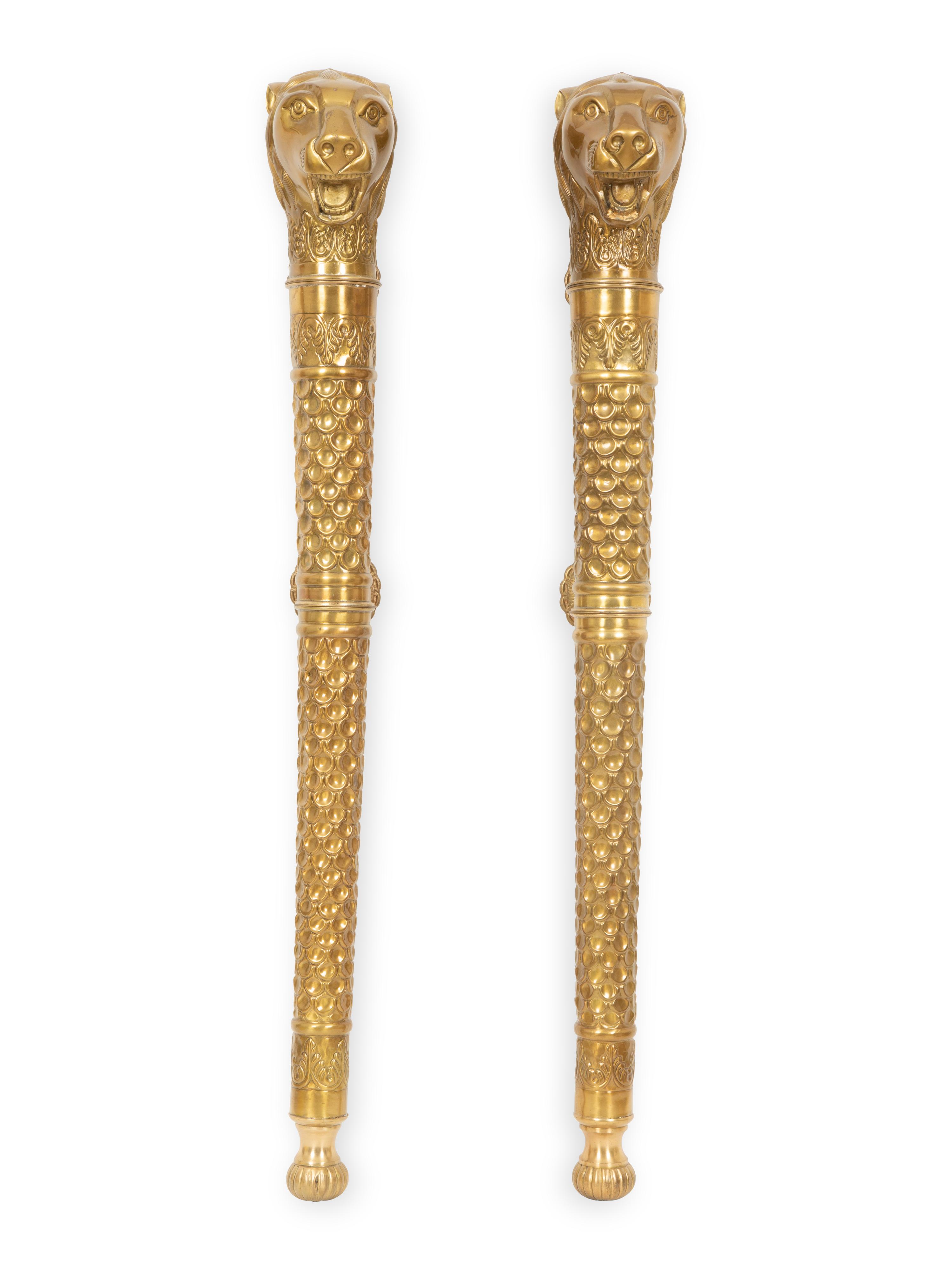 A Pair of Continental Chased Brass Door or Wall Mounts