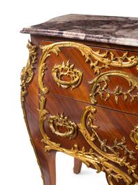 A Louis XV Style Gilt Metal Mounted Kingwood Marble-Top Bombé Commode