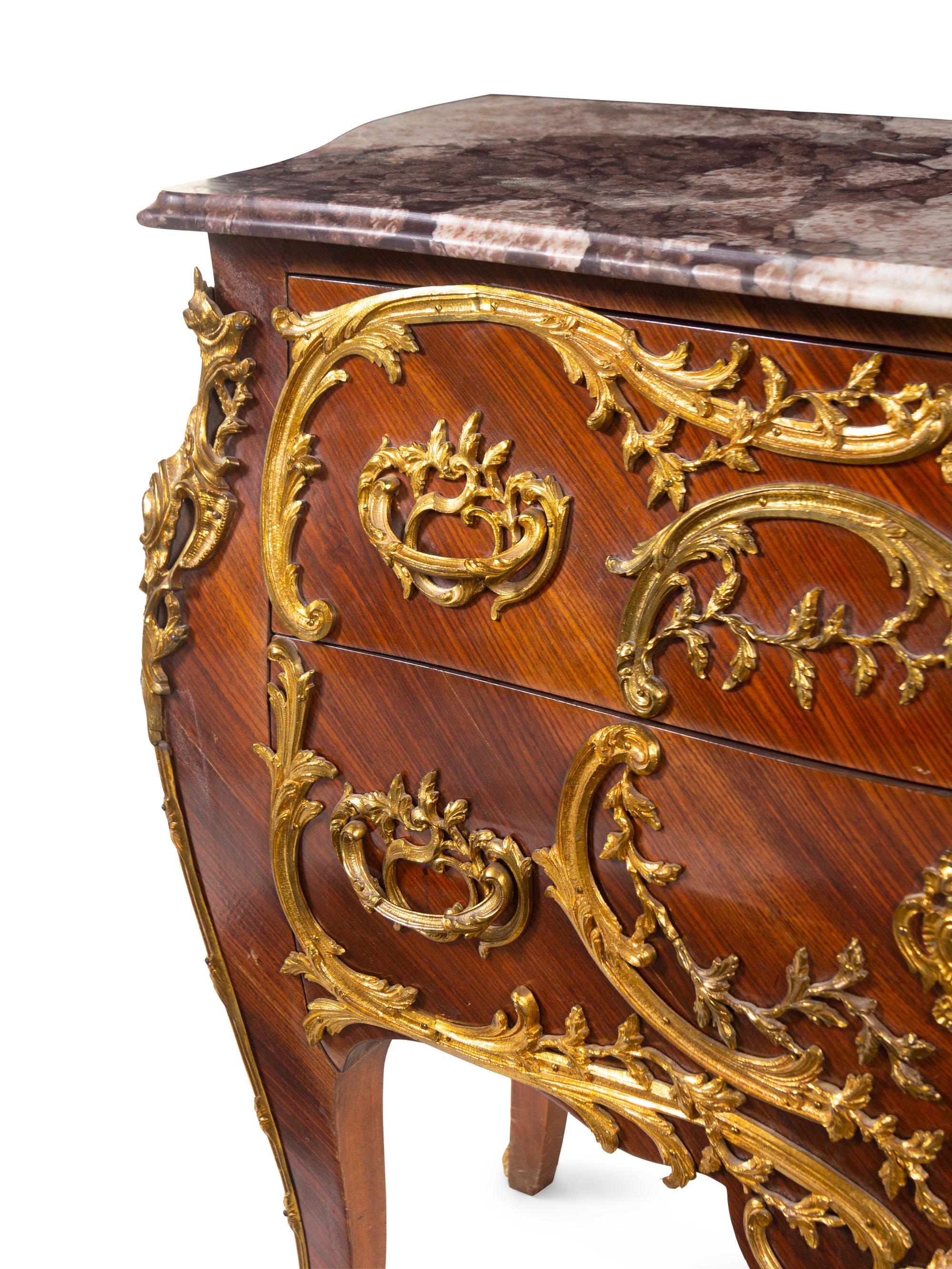 A Louis XV Style Gilt Metal Mounted Kingwood Marble-Top Bombé Commode