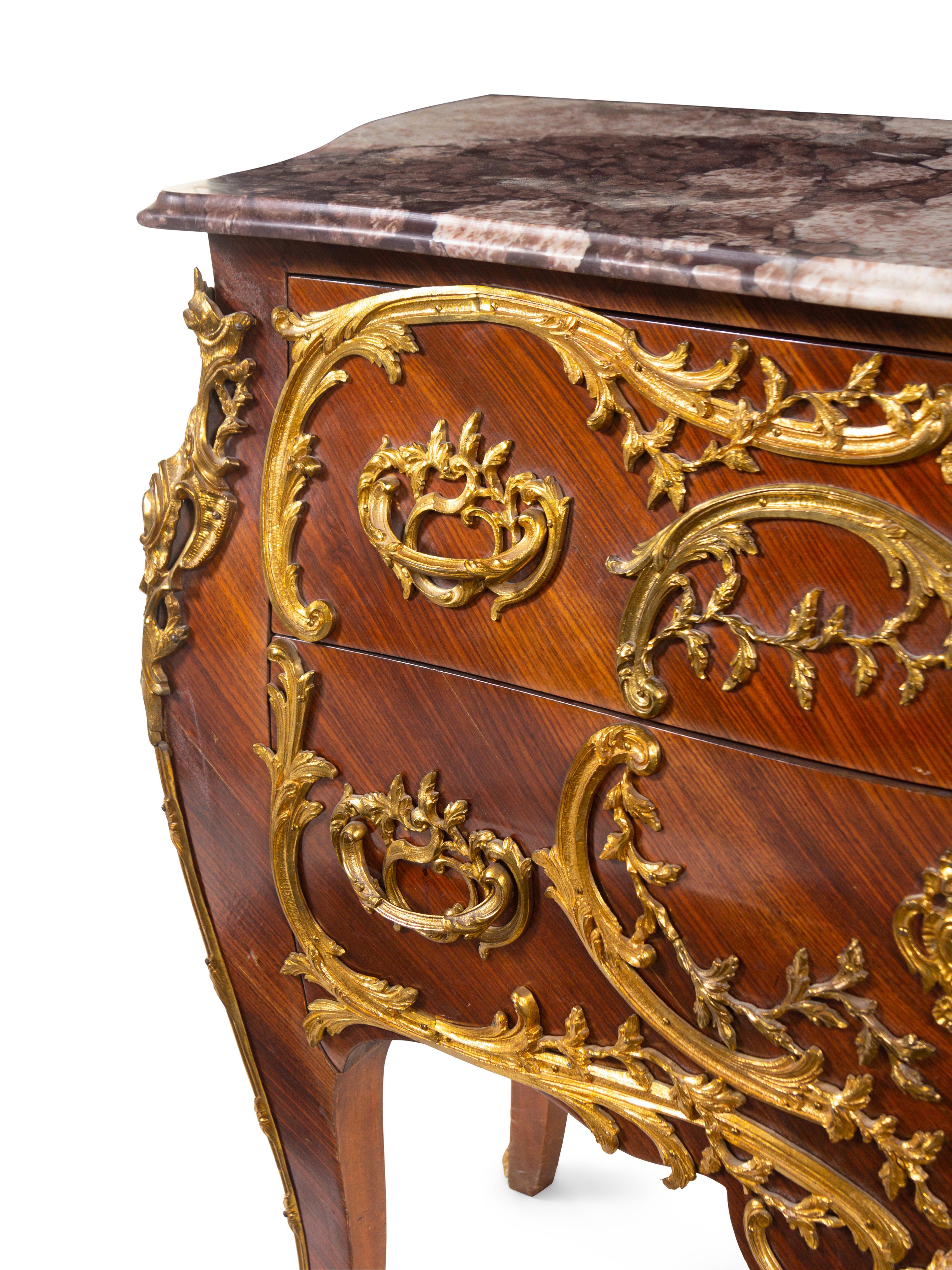 A Louis XV Style Gilt Metal Mounted Kingwood Marble-Top Bombé Commode