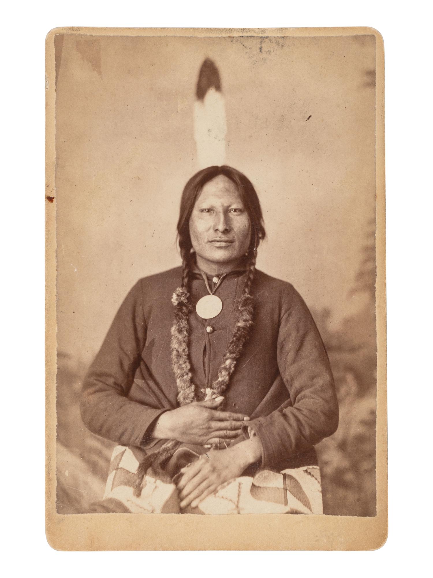 [GOFF, O.S. (1843-1916), photographer]. Cabinet card portrait of Rain-in-the-Face. [Bismarck, Dakota Territory].