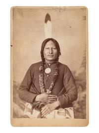 [GOFF, O.S. (1843-1916), photographer]. Cabinet card portrait of Rain-in-the-Face. [Bismarck, Dakota Territory].