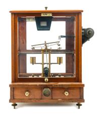 An English Mahogany Cased Brass Assayer's Balance Height of case 19 1/2 x width 14 1/2 x depth 10 1/2 inches. — L. OERTLING, LONDON, 20TH CENTURY