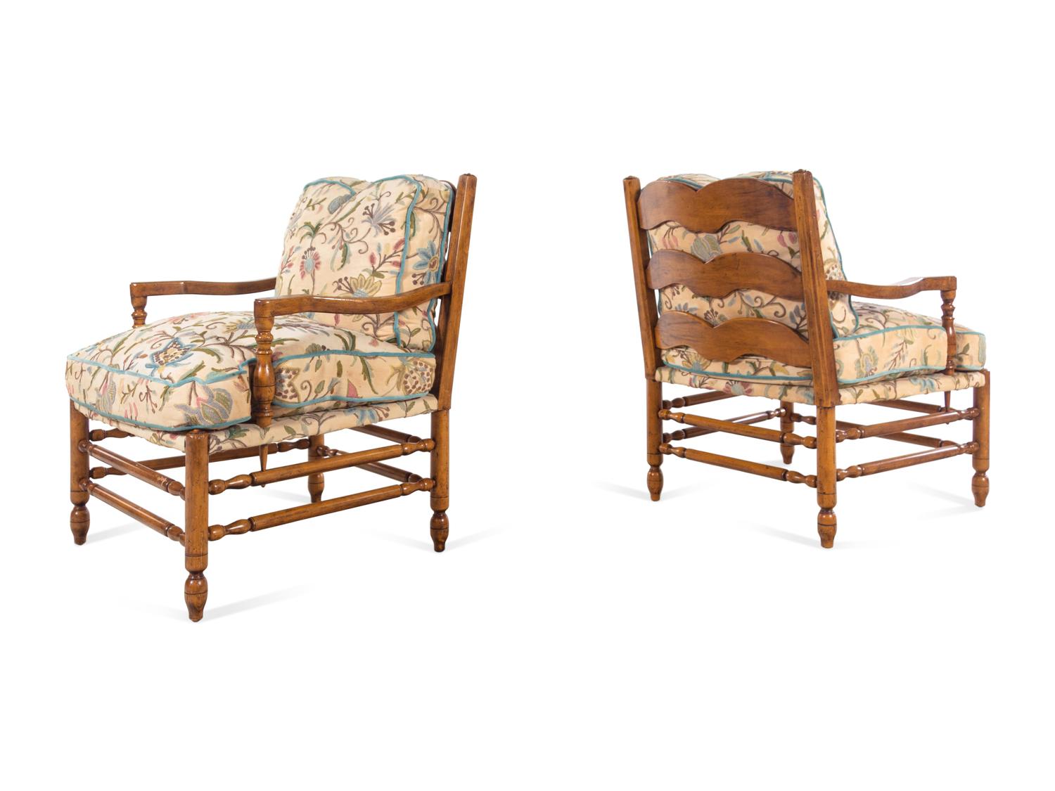 A Pair of Turned Walnut Armchairs with Crewelwork Upholstery