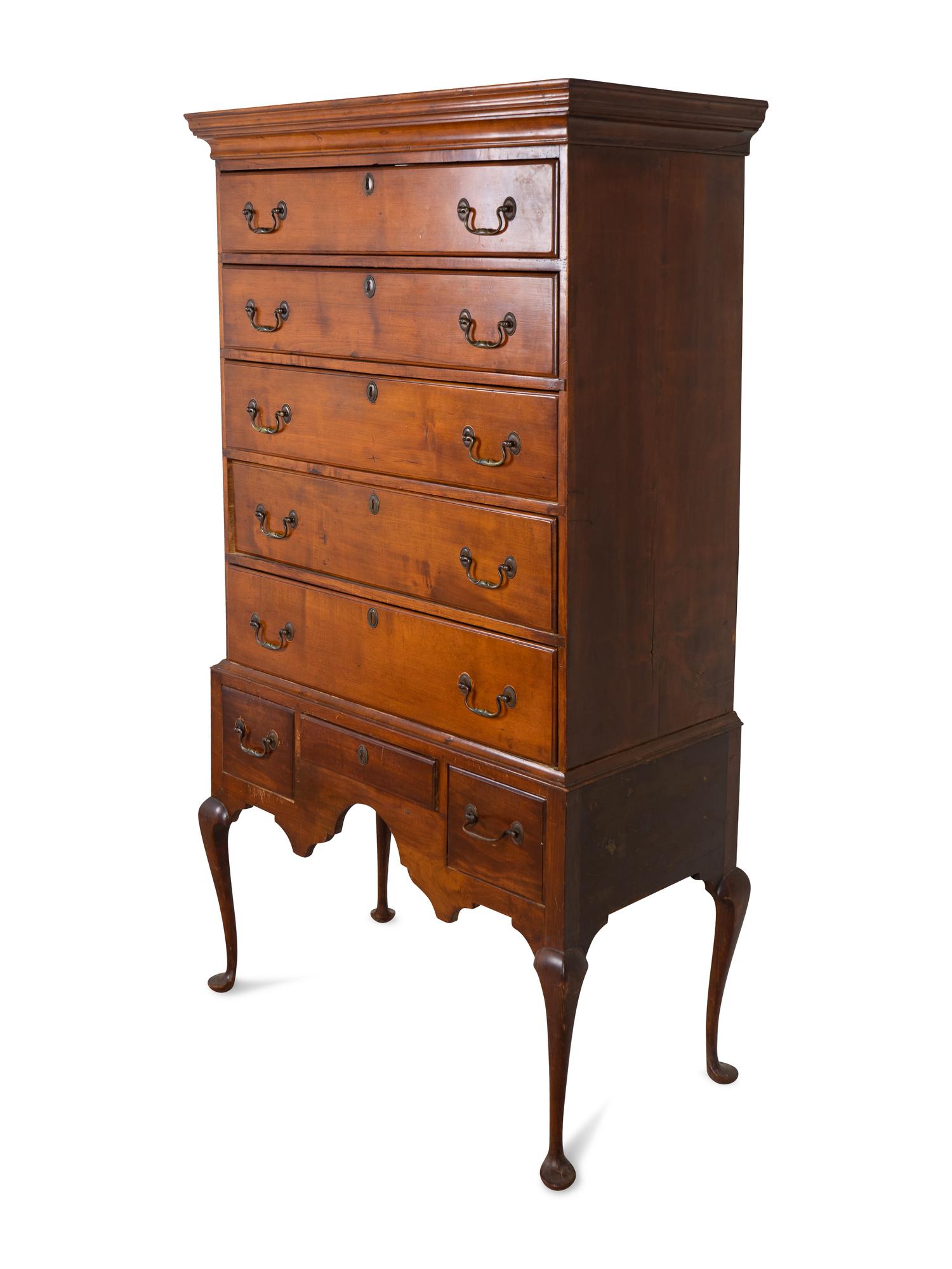 A Queen Anne Cherrywood Flat-Top Highboy — THIRD QUARTER 18TH CENTURY
