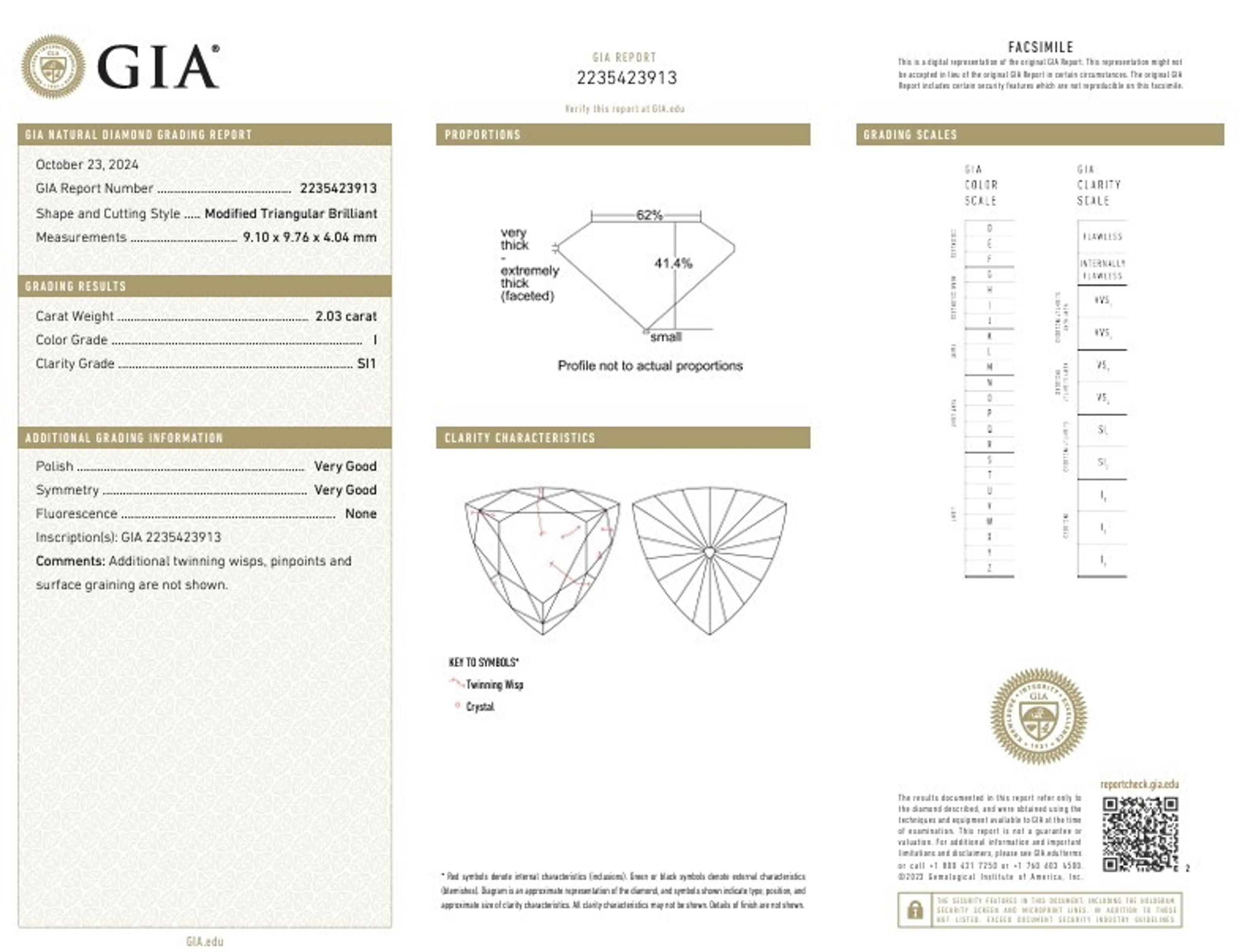 TRIANGULAR DIAMOND RING