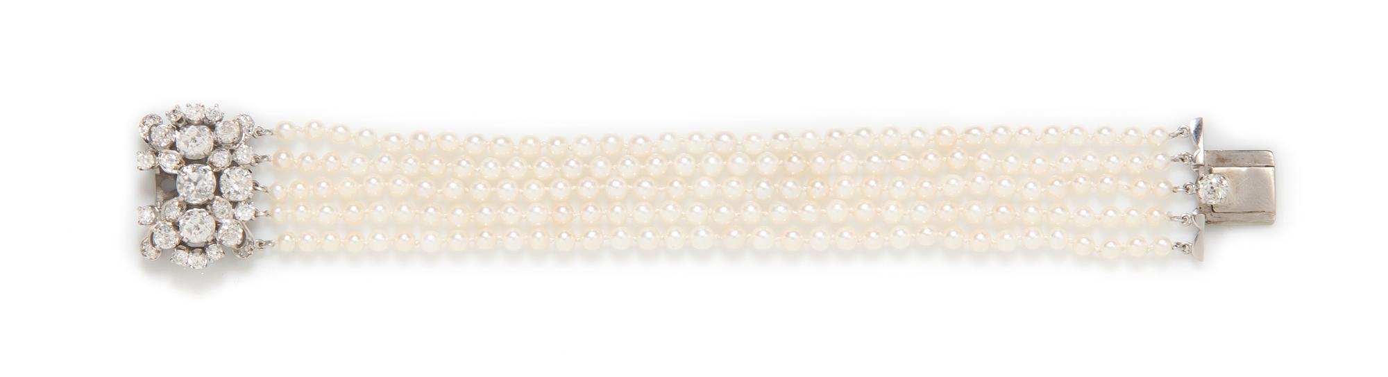 An Edwardian Platinum, Diamond and Pearl Multi Strand Bracelet, 17.50 dwts.