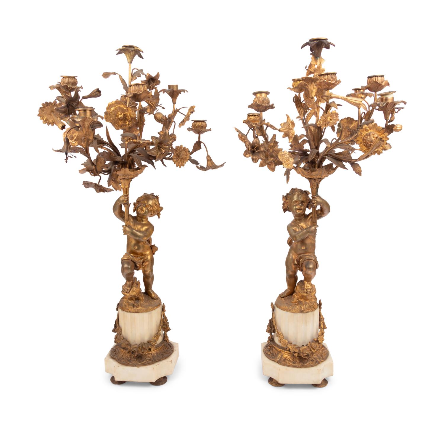 A Pair of French Gilt Bronze and Marble Figural Eight-Light Candelabra