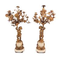 A Pair of French Gilt Bronze and Marble Figural Eight-Light Candelabra