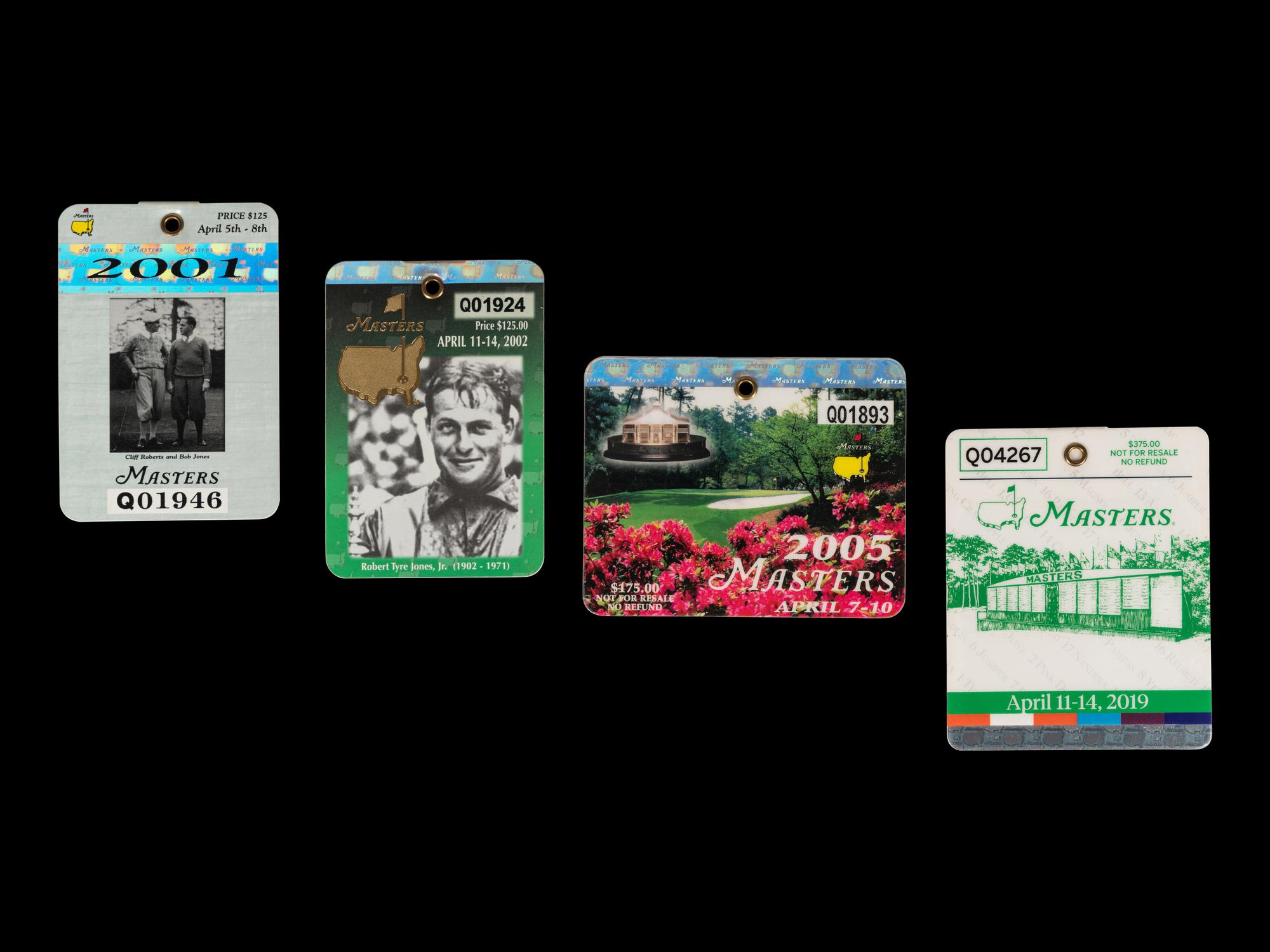 A Group of Four Tiger Woods Augusta National Masters Championship Badges (2001, 2002, 2005, 2019)