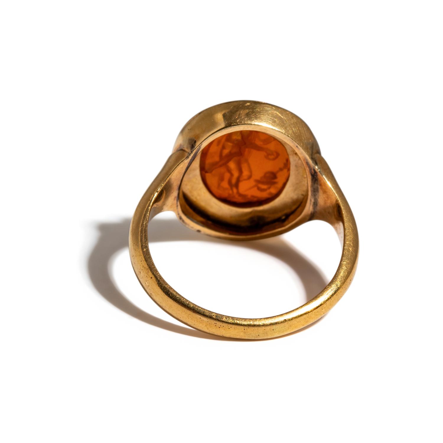 A Neoclassical Gold and Carnelian Finger Ring with the Goddess Ceres at an Alter
