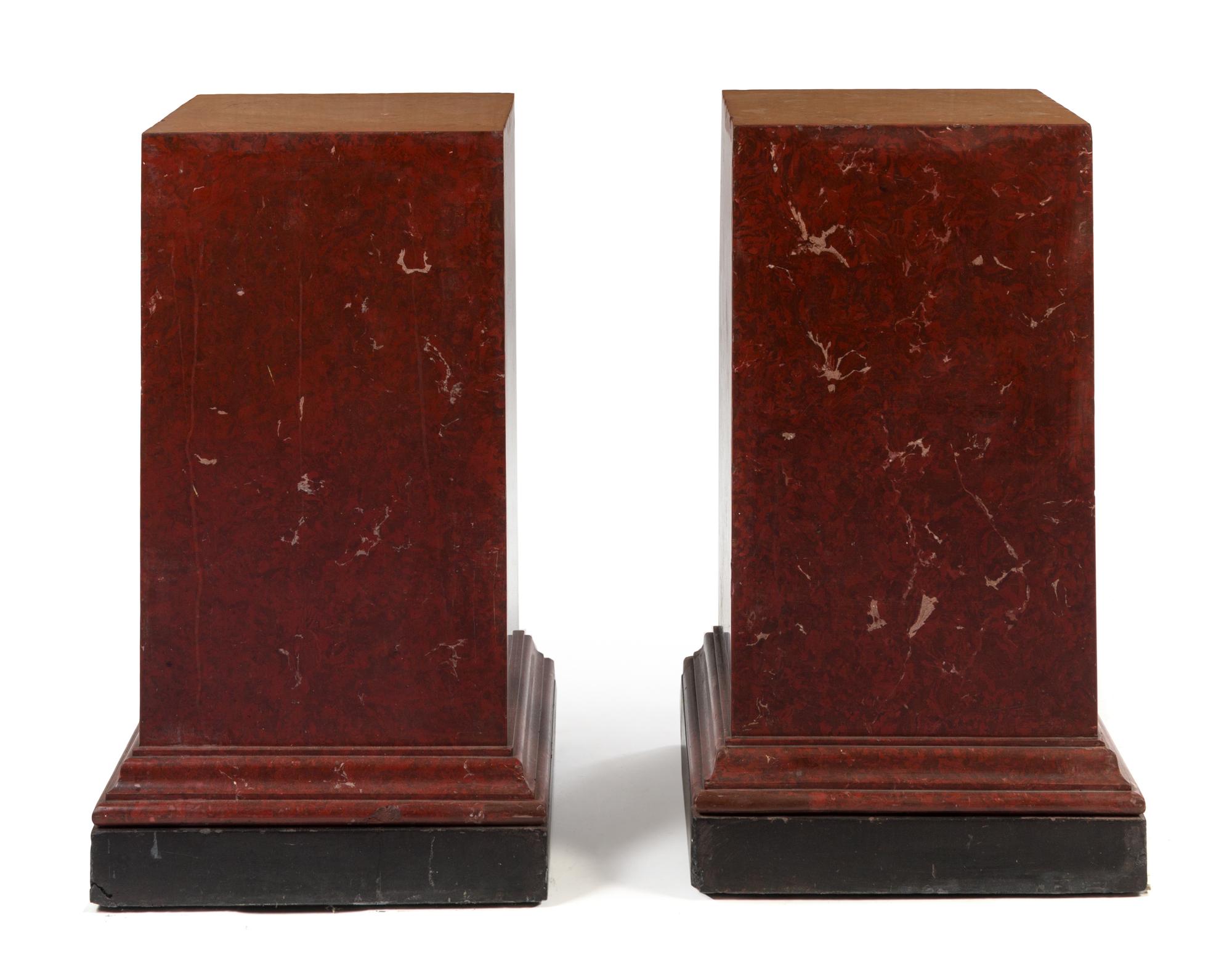 A Pair of Marble Pedestals Height 30 1/4 x width of top 14 1/2 x depth of top 14 1/2 inches.