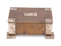 An Arts and Crafts Bronze and Silver Table Casket