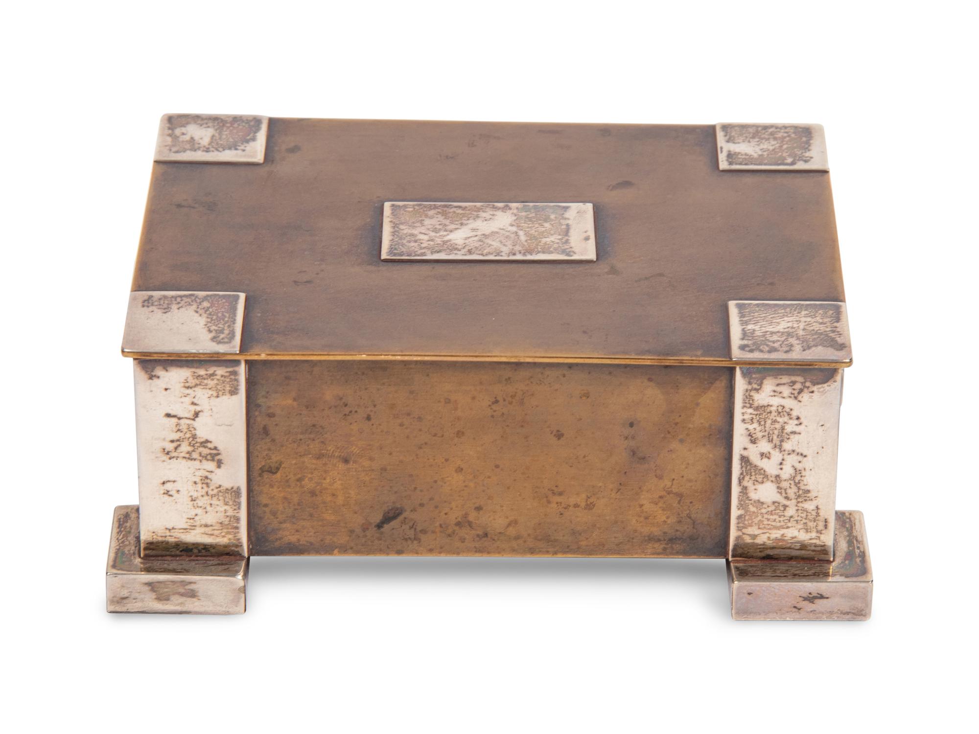 An Arts and Crafts Bronze and Silver Table Casket