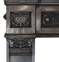 A Cast Iron Fireplace Mantel 58.5" W x 9" D x 53.5" H — England, Late 19th Century
