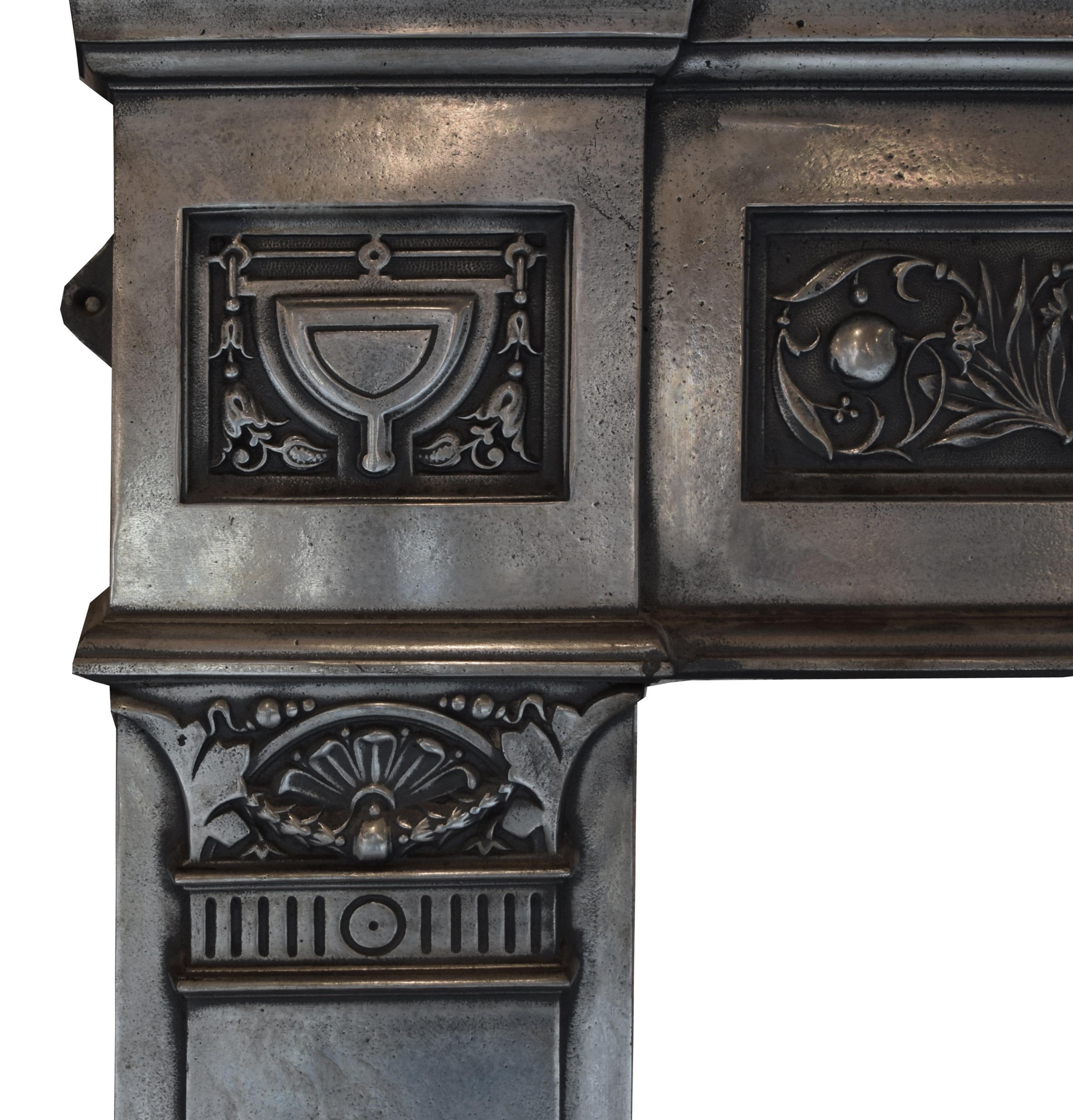 A Cast Iron Fireplace Mantel 58.5" W x 9" D x 53.5" H — England, Late 19th Century
