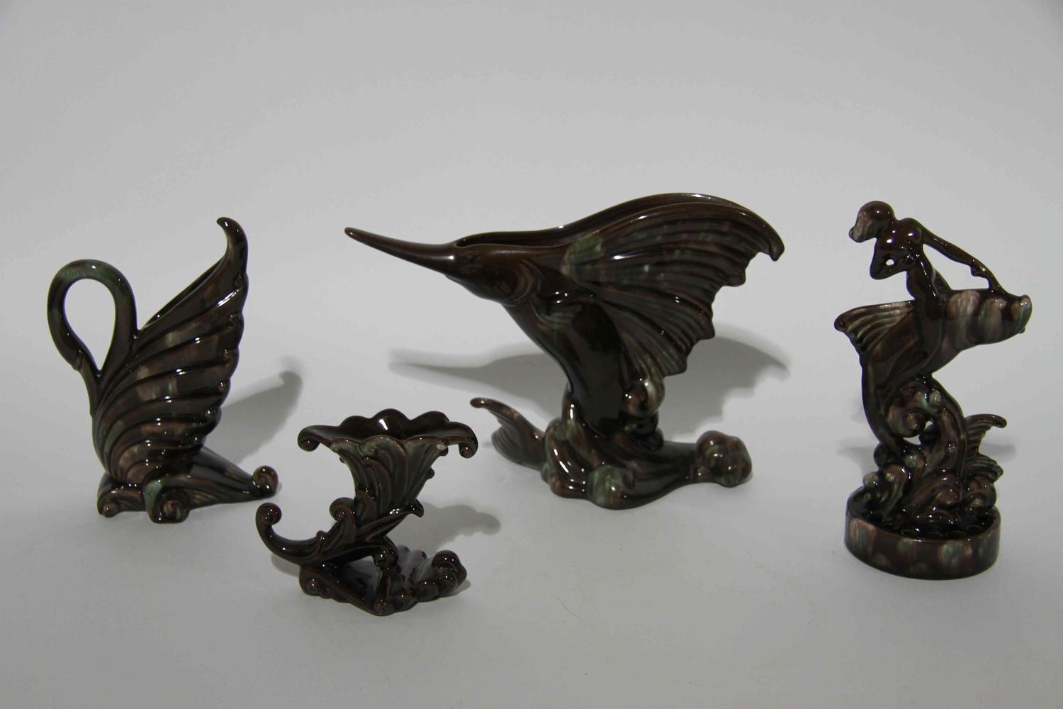 A Group of Seven Haeger Pottery Table Articles Width of widest 14 1/2 inches.