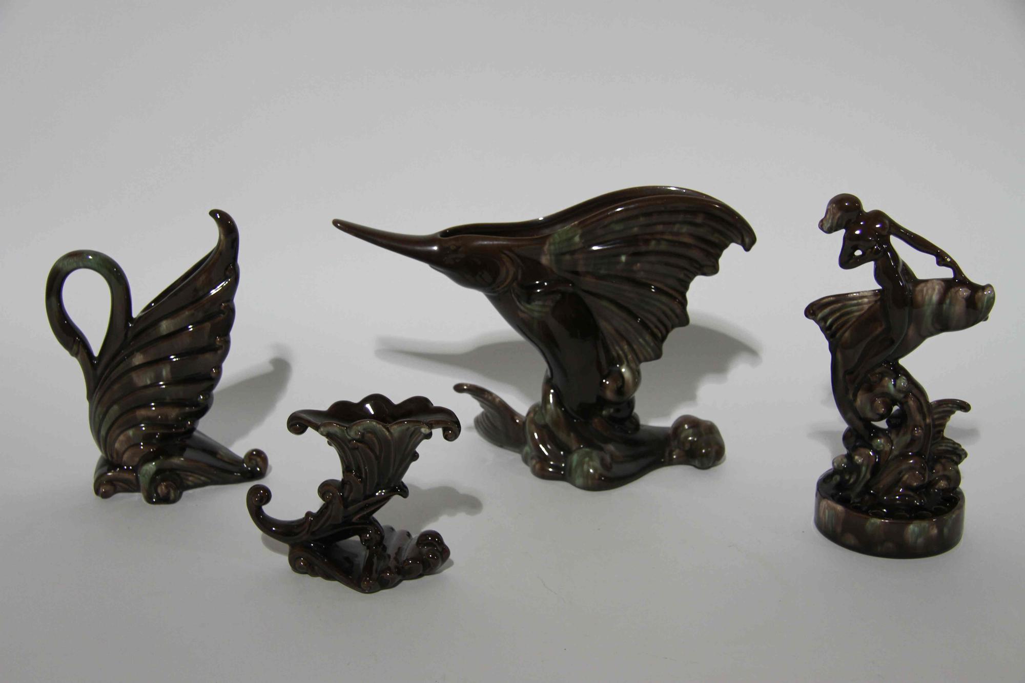 A Group of Seven Haeger Pottery Table Articles Width of widest 14 1/2 inches.