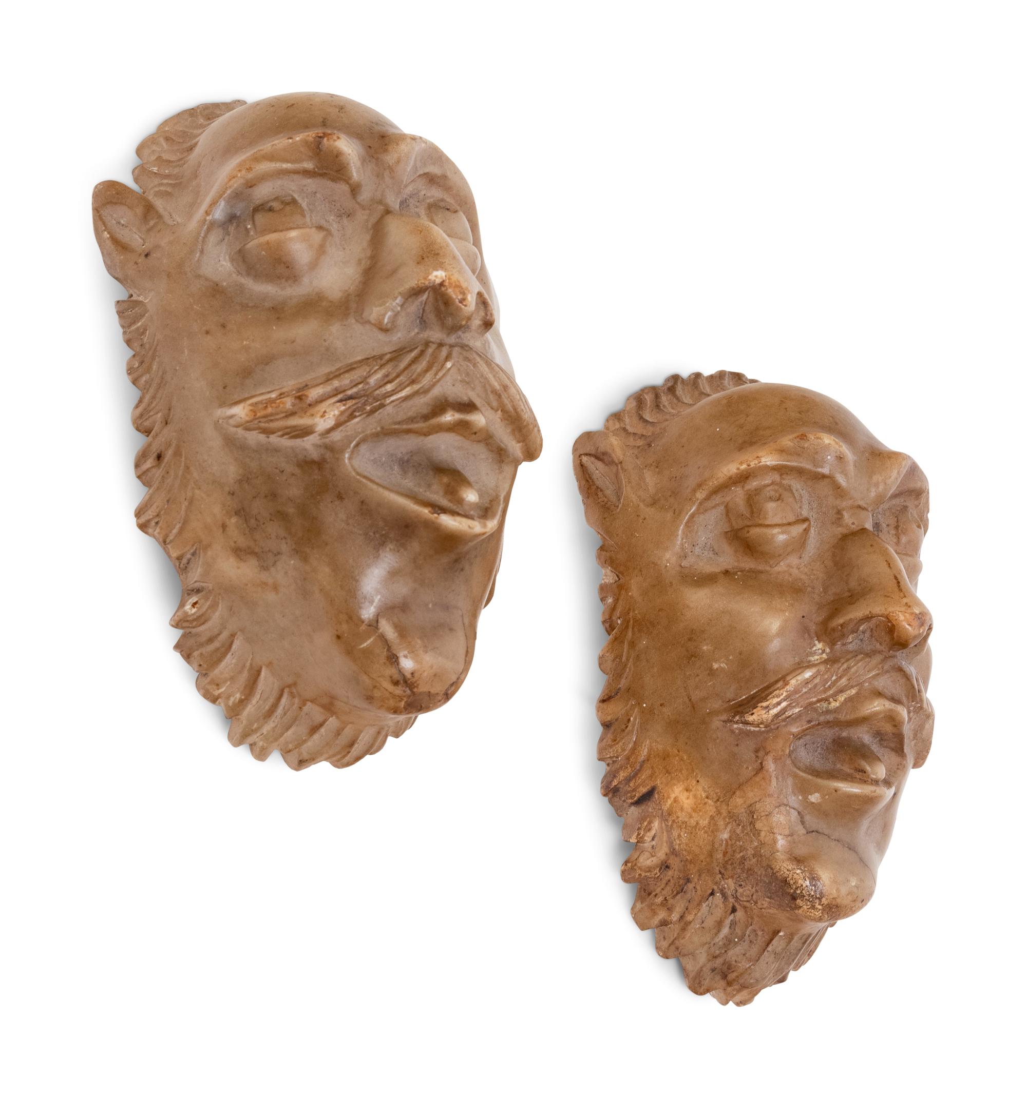 Two Continental Carved Alabaster Masks