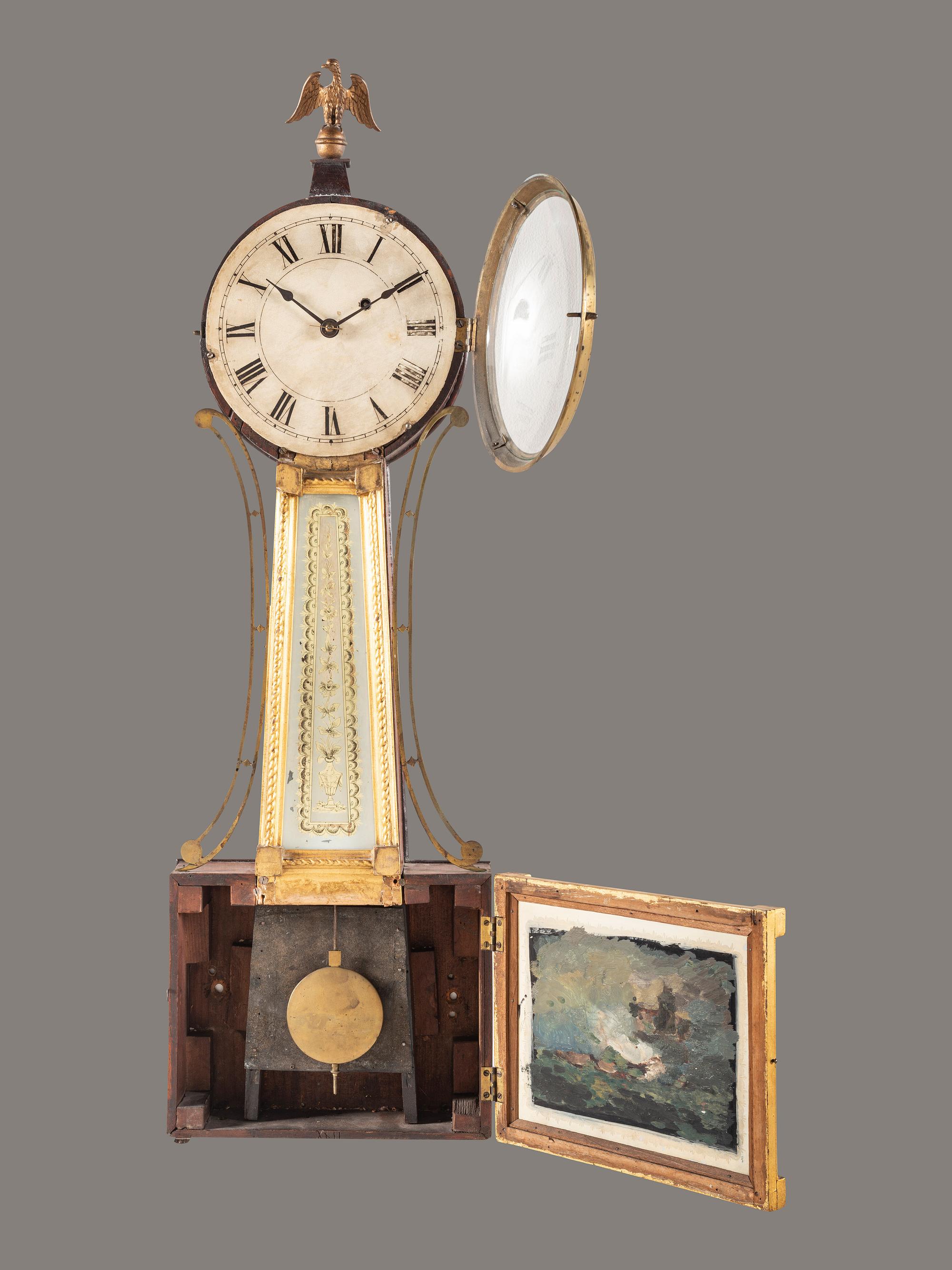 A Federal Giltwood, Brass and Eglomise War of 1812 Banjo Clock
