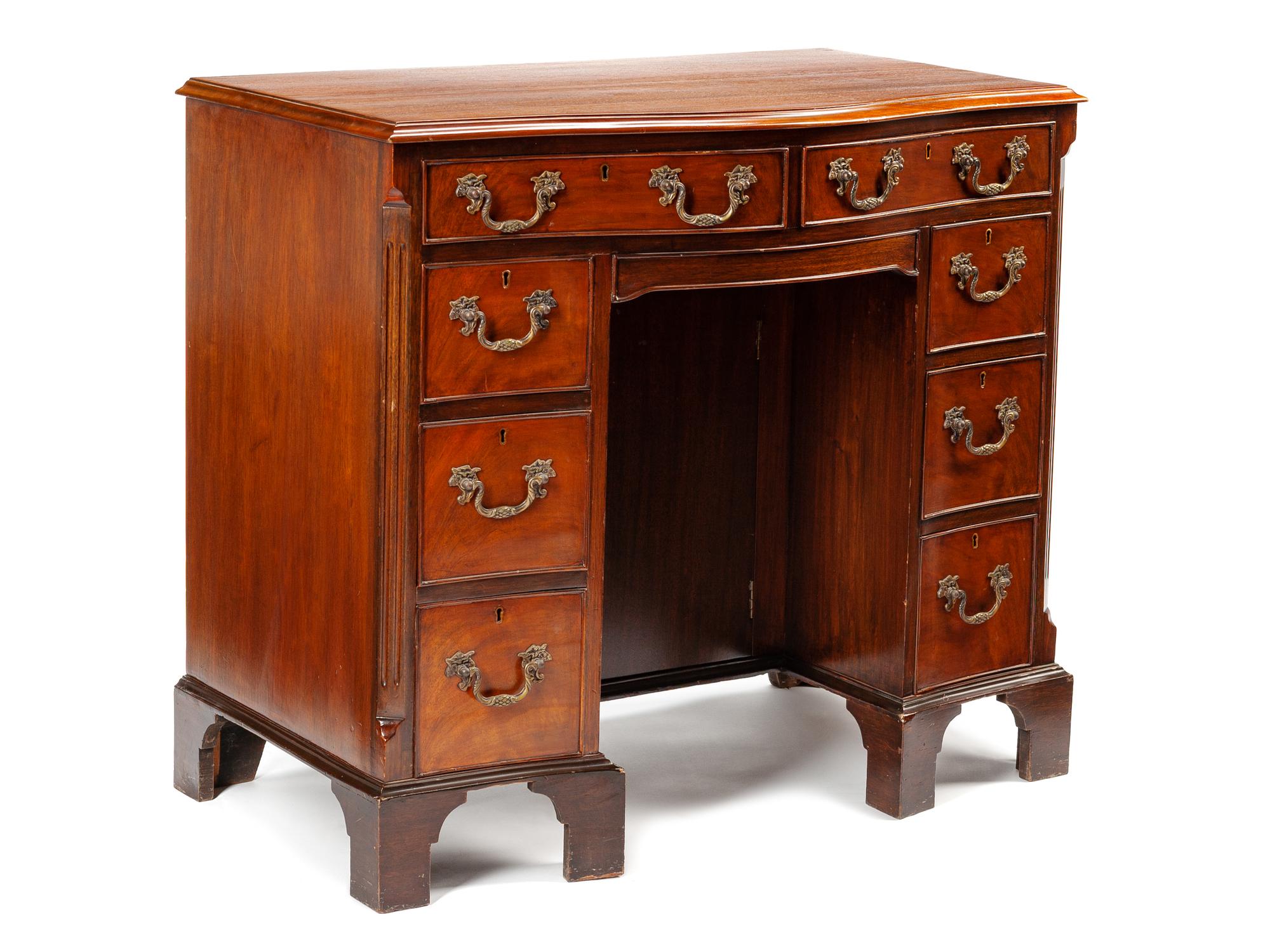 A George III Style Mahogany Kneehole Desk