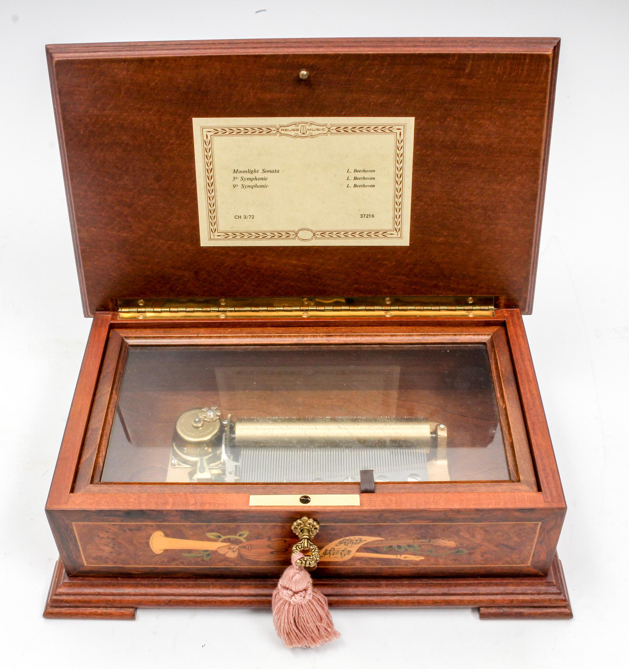 A Marquetry Decorated Music Box Length 11 1/2 inches. — 20TH CENTURY