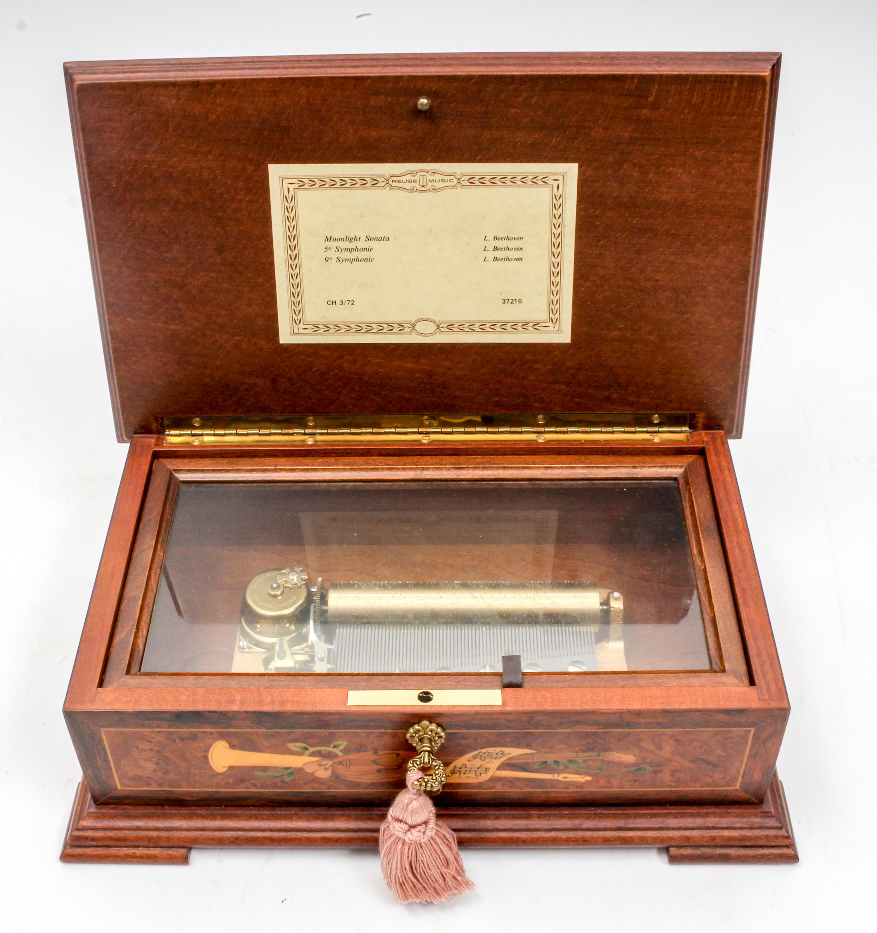 A Marquetry Decorated Music Box Length 11 1/2 inches. — 20TH CENTURY
