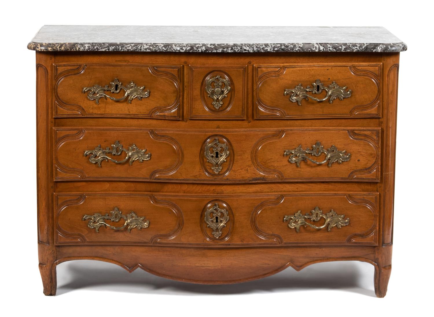 A French Provincial Carved Walnut Commode — LATE 19TH CENTURY
