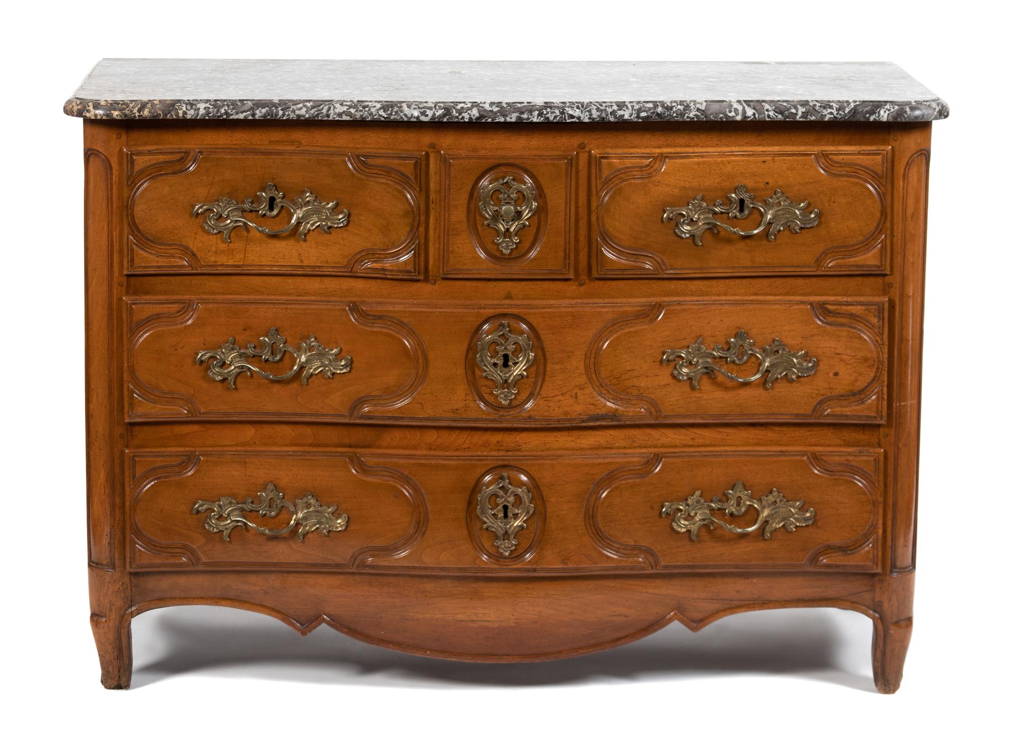 A French Provincial Carved Walnut Commode — LATE 19TH CENTURY