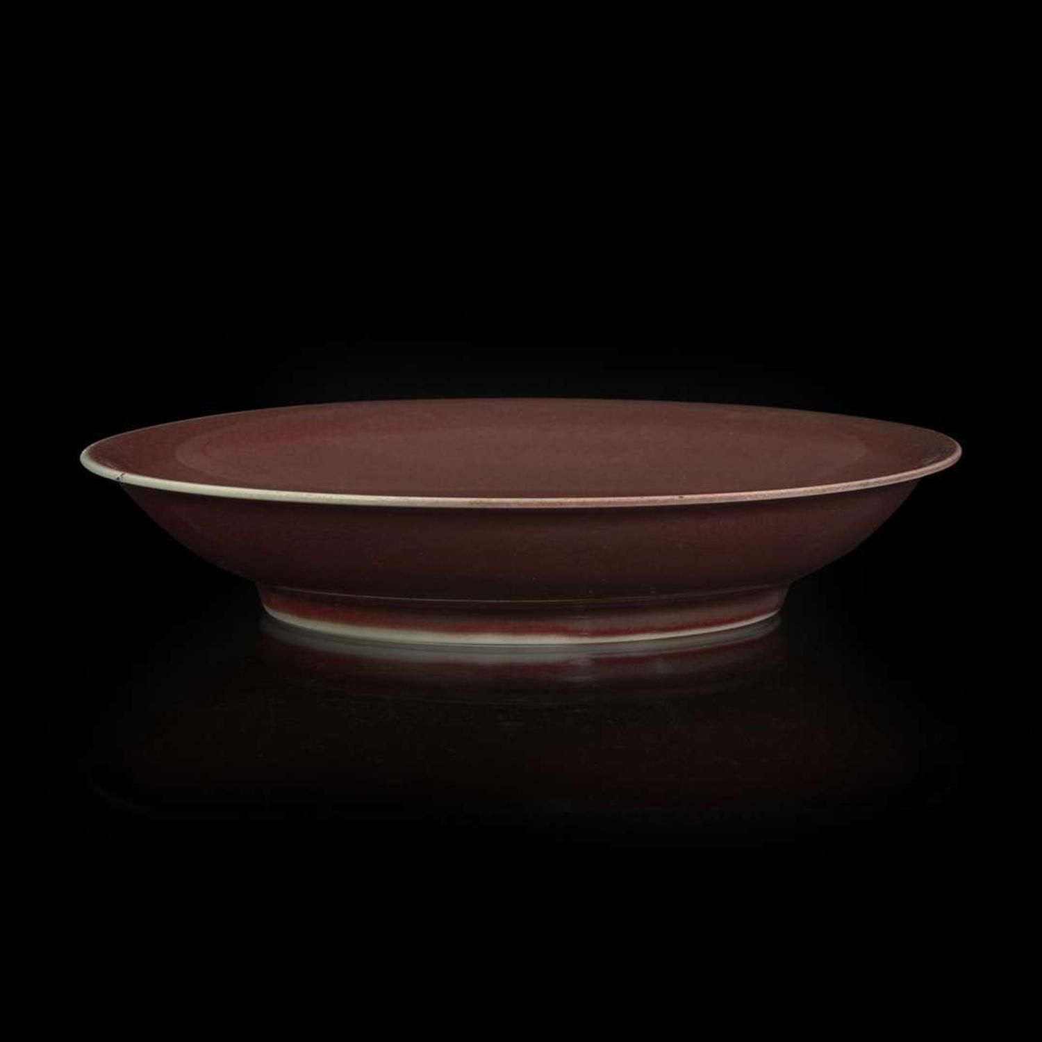 A Chinese copper-red glazed dish 釉里红碟子 Xuande incised six-character mark ???????
