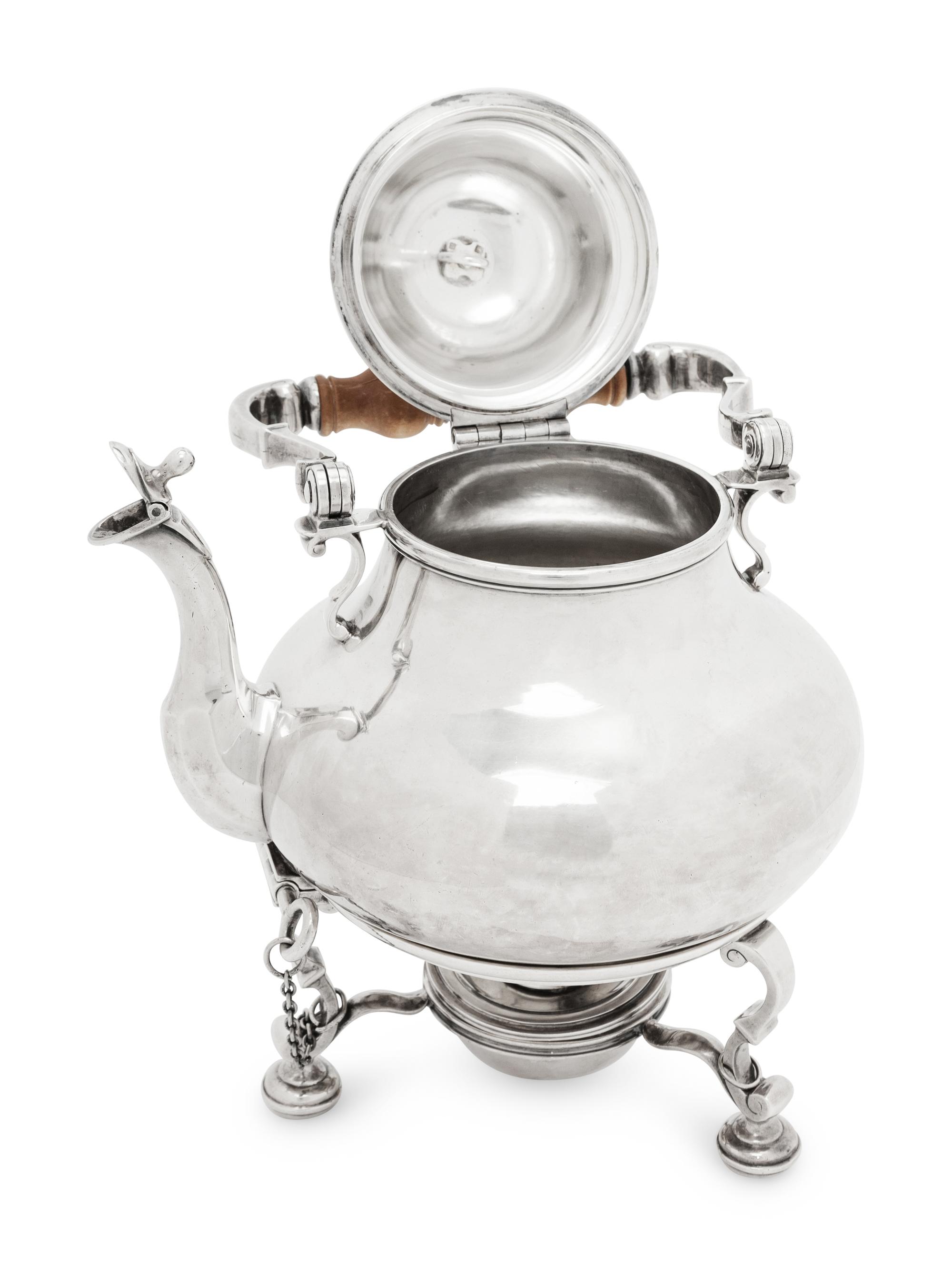 An English Silver Kettle on Lamp Stand