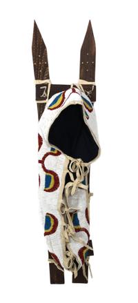 A Northern Plains Style Beaded Cradle on Sticks Length over all 42 inches