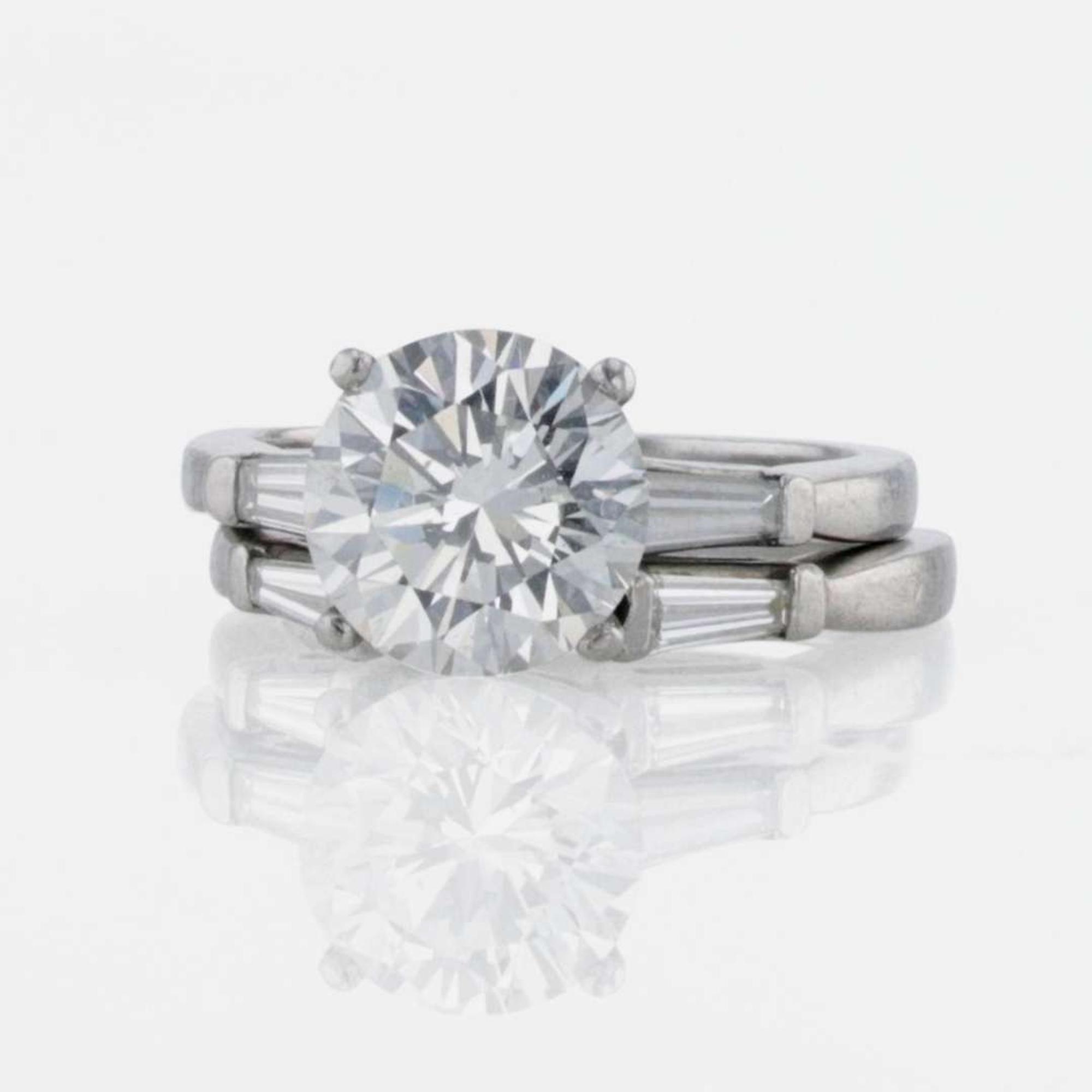 A Platinum and Diamond Ring 3.23 Carat Round Brilliant Diamond, GIA Certified