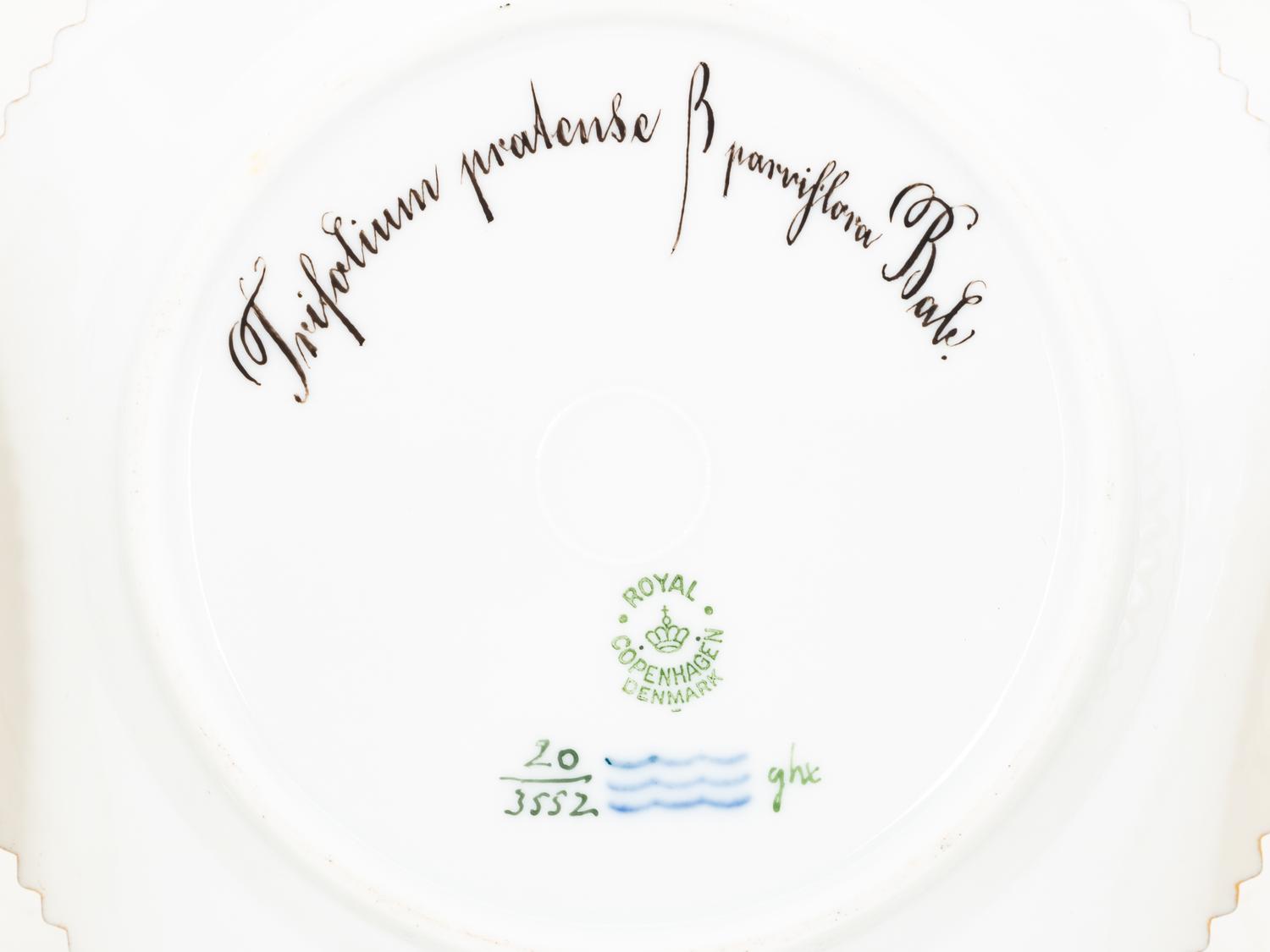 A Set of Fourteen Royal Copenhagen Flora Danica Bread Plates