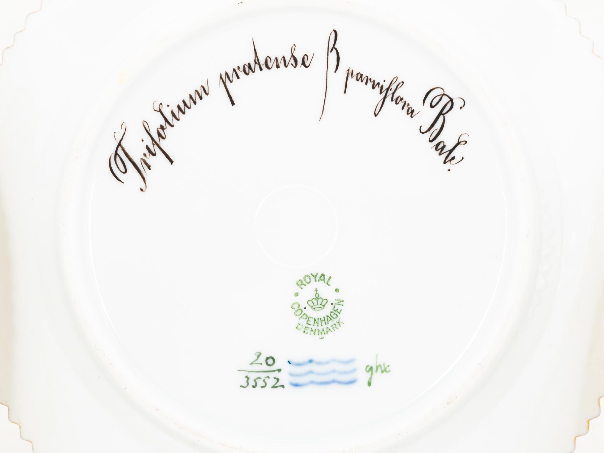 A Set of Fourteen Royal Copenhagen Flora Danica Bread Plates