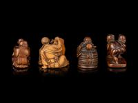 Four Japanese Carved Wood Figural-Form Netsuke