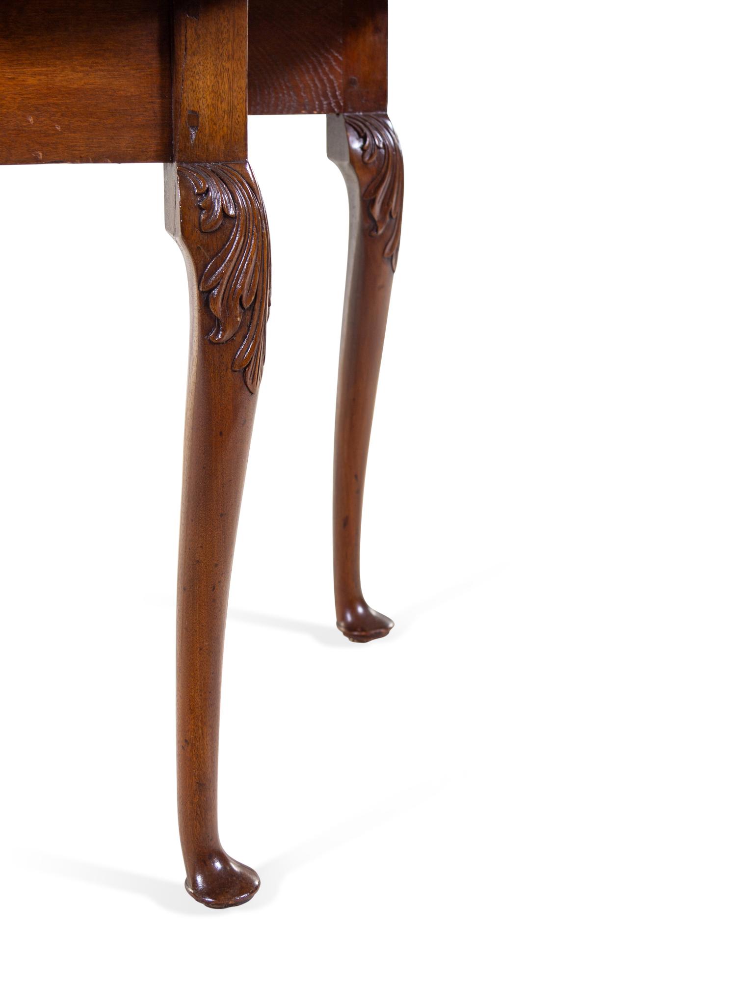 A Queen Anne Mahogany Drop-Leaf Table