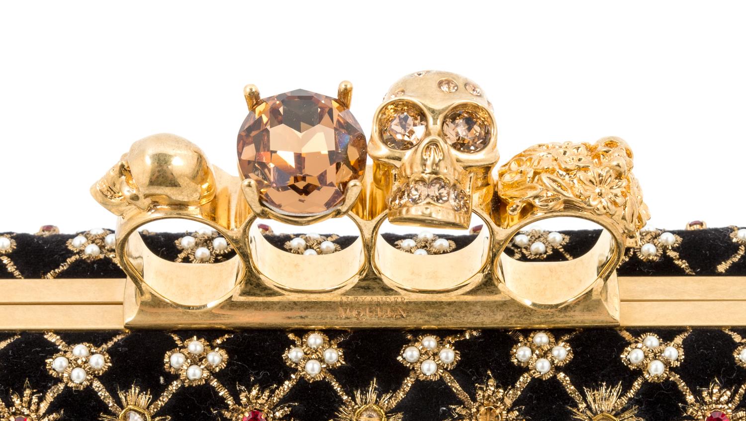 An Alexander McQueen Rhombic Embroidered Knuckle Clutch, 9" x 4" x 2".