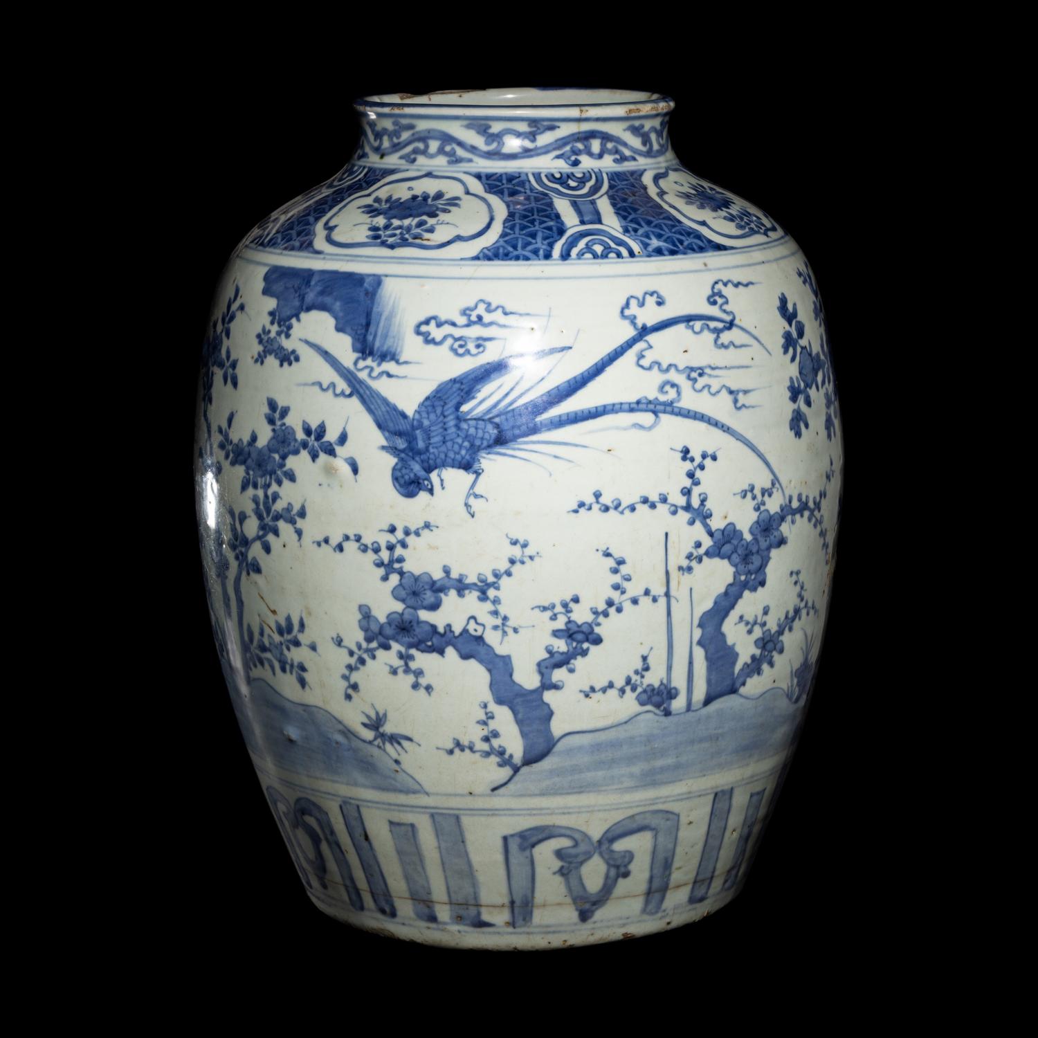 A Chinese Blue and White 'Birds and Trees' Porcelain Jar, 16th/17th Century 明末清初 青花花鳥圖大罐