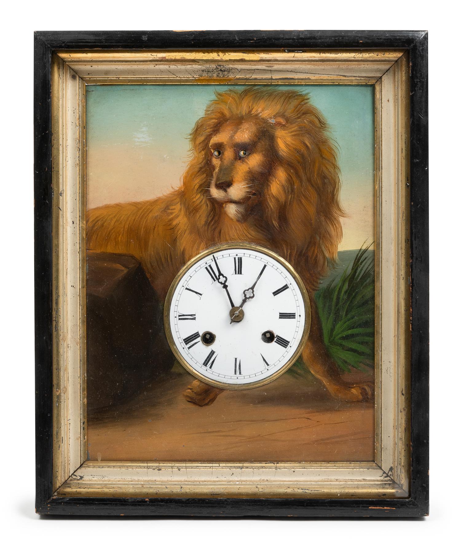 A French Polychromed Lion Wall Clock Height 13 1/2 x width 9 1/2 x depth 5 1/2 inches. — 19TH CENTURY
