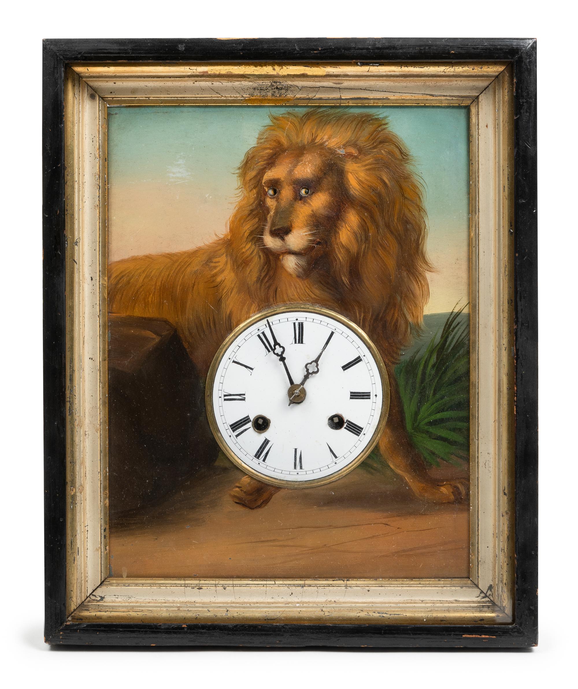 A French Polychromed Lion Wall Clock Height 13 1/2 x width 9 1/2 x depth 5 1/2 inches. — 19TH CENTURY