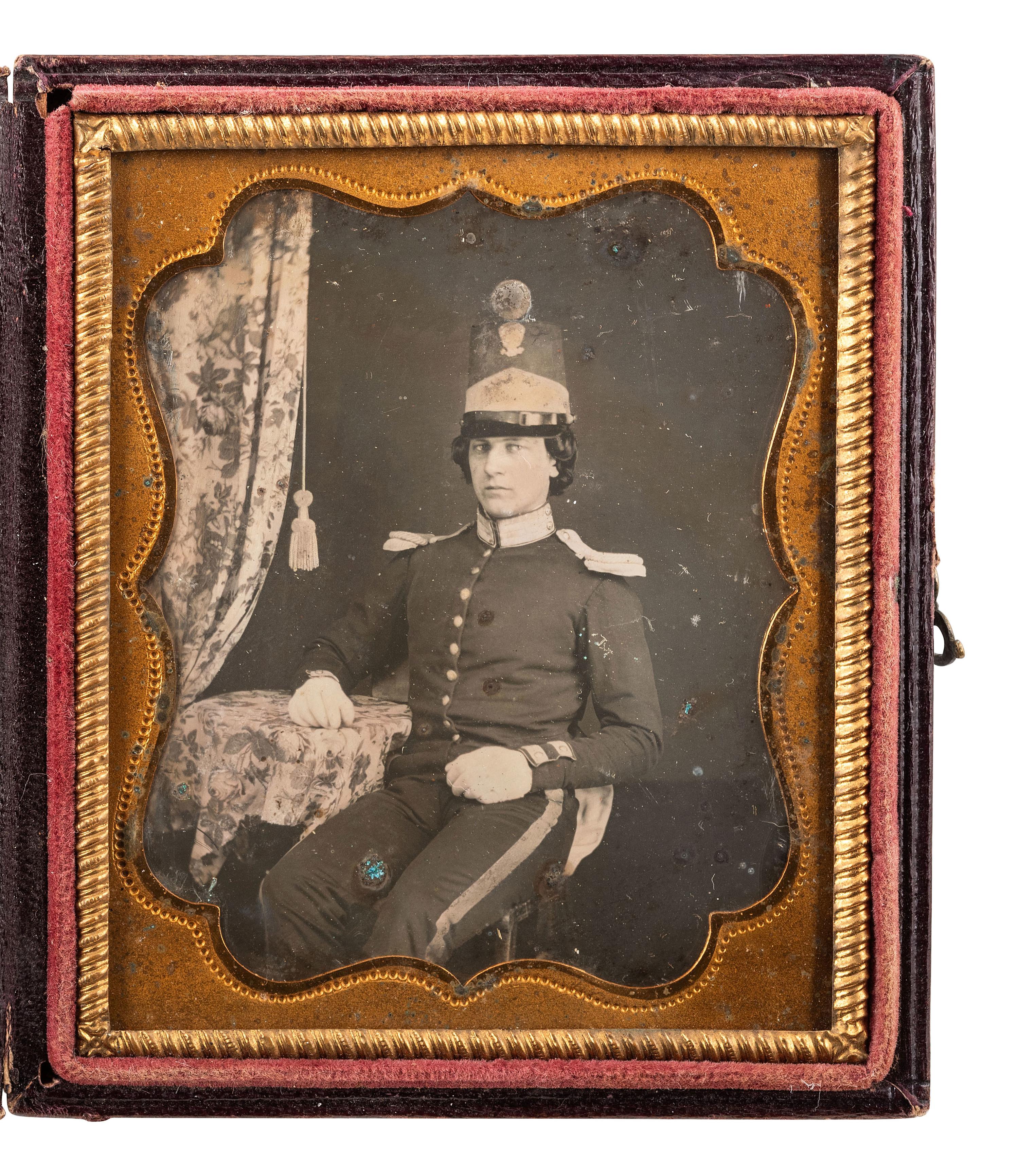 [MILITARIA - EARLY PHOTOGRAPHY]. Sixth plate daguerreotype of a militiaman wearing a shako with eagle and pompon. Ca 1850s.