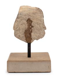 A Continental Carved Stone Head